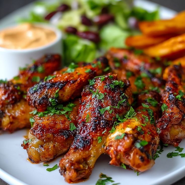 BONELESS FLAMED PERI PERI GRIDDLED BONELESS CHICKEN WINGS, HERB ROASTED POTATO LADRILLOS