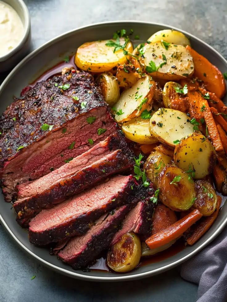 ROASTED BRISKET OF BEEF, RED WINE JUS, ROASTED VEG, BEEF DRIPPING ROASTERS
